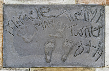 The concrete has set with Timmy's mark - Miracle Man